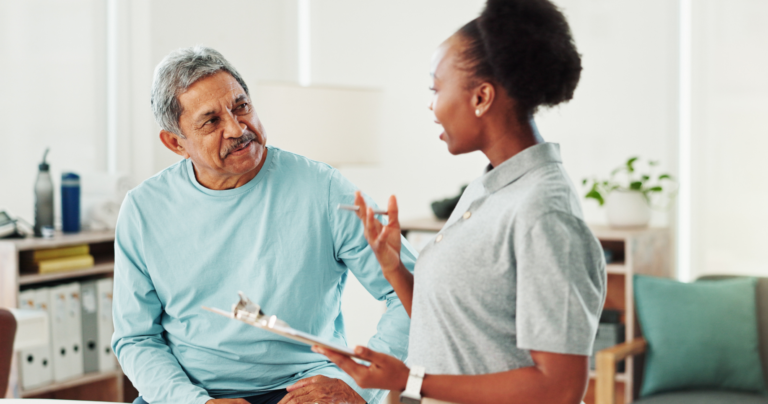Healthcare professional talking to patient